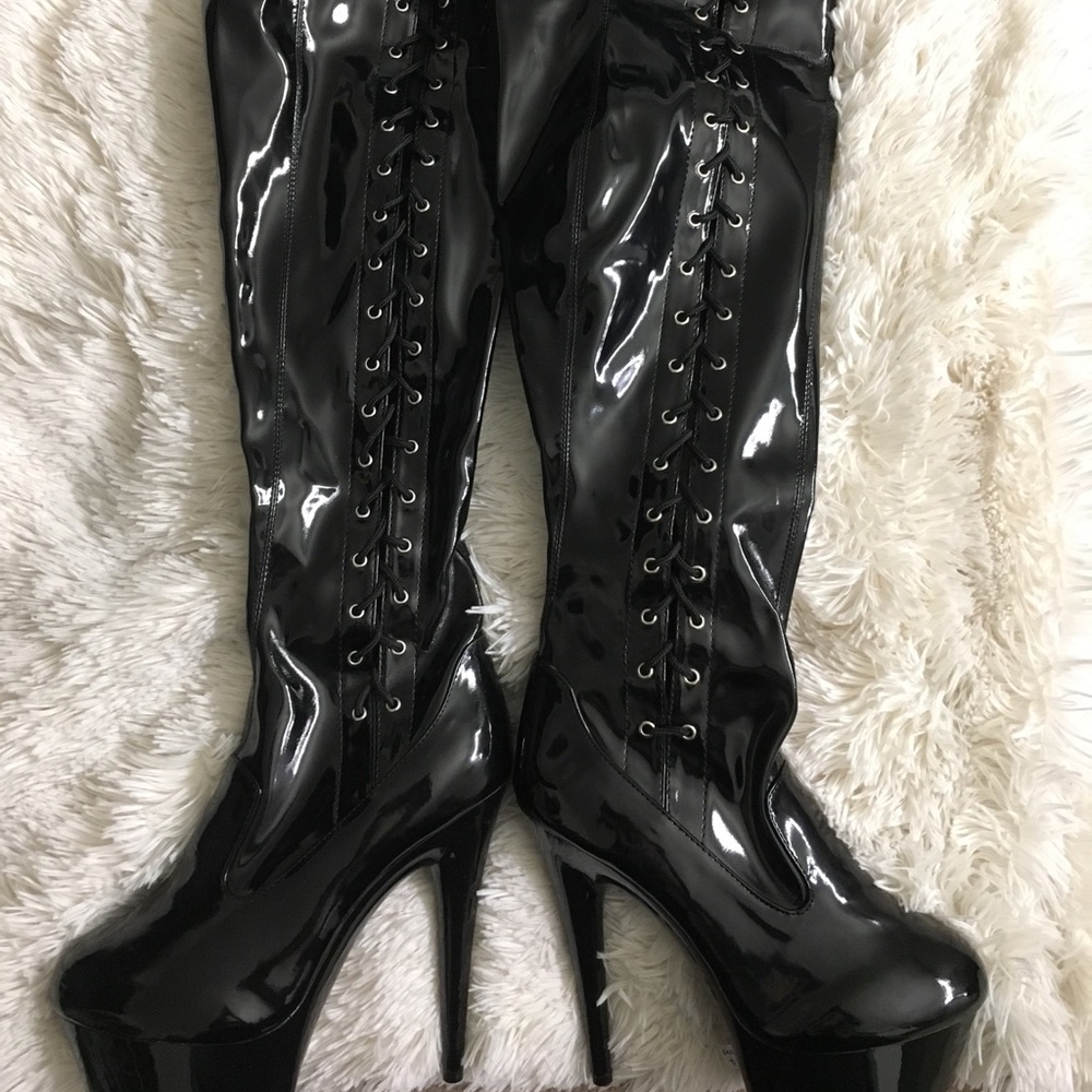 Elle Thigh-High Ferocious Black Lace-Up Boots